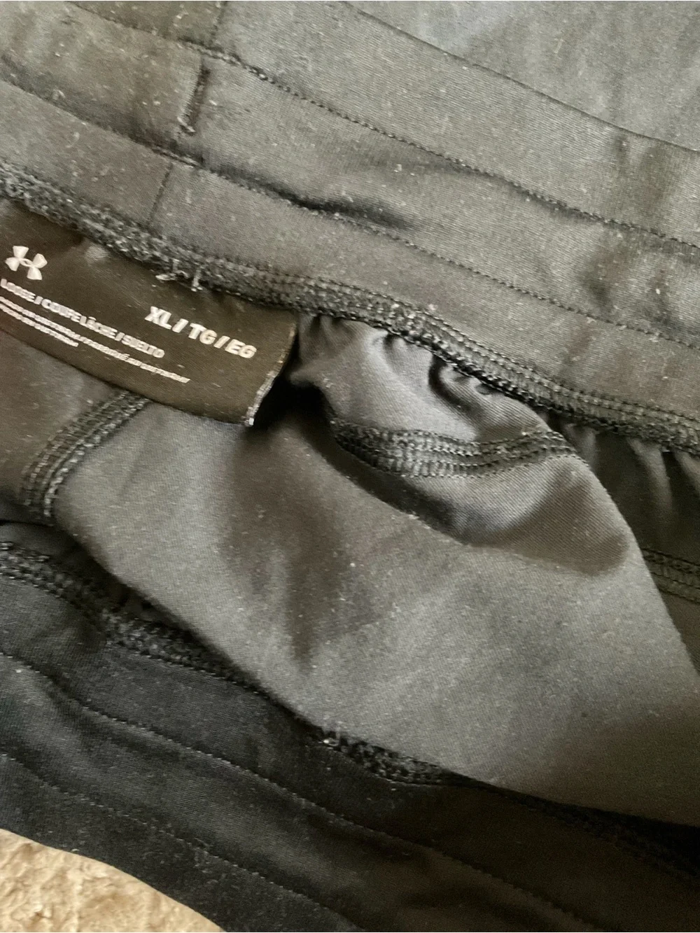 Men’s used as is Under Armour project rock black unlimited UA shorts size XL